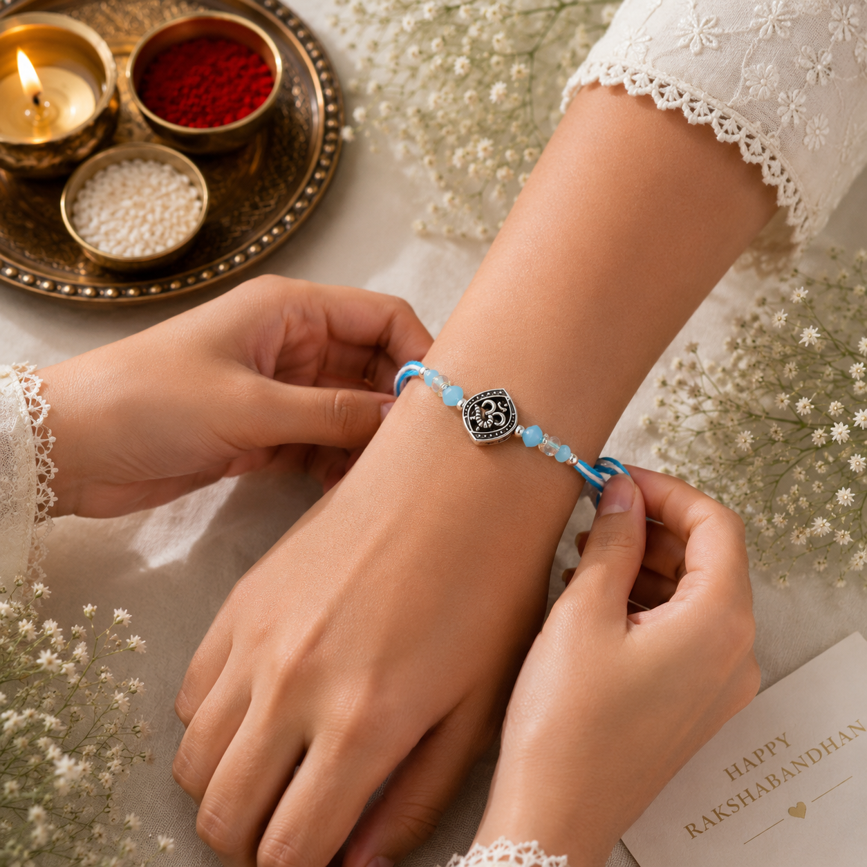 Set of 3 Designer Rakhi Combo – Om Rakhi, Divine Charm Rakhi & Traditional Pearl Rakhi