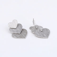 Rhodium Plated Linked Hearts Drop Earrings