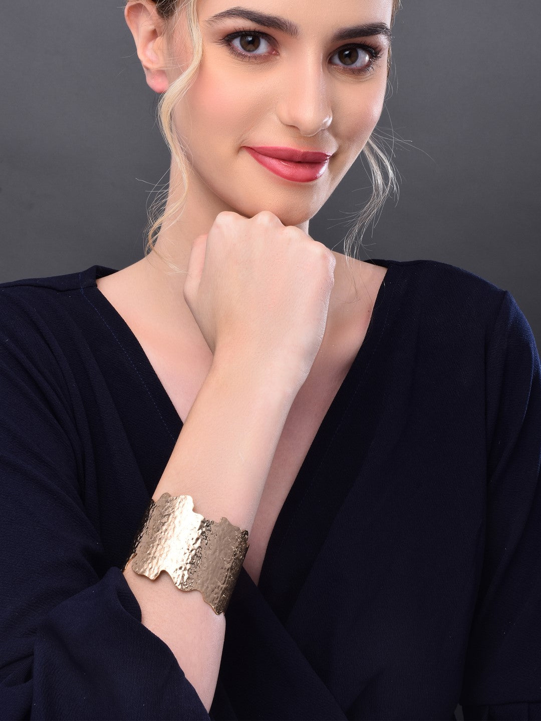 Gold hammered uneven cut gold bangle