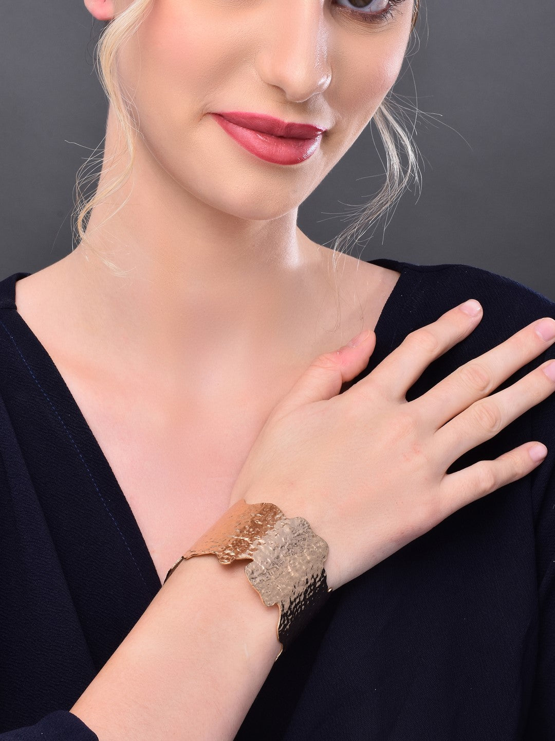 Gold hammered uneven cut gold bangle