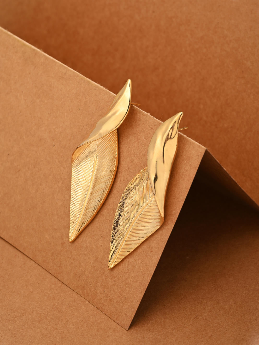 Gold Twirl Leaf shape Earring
