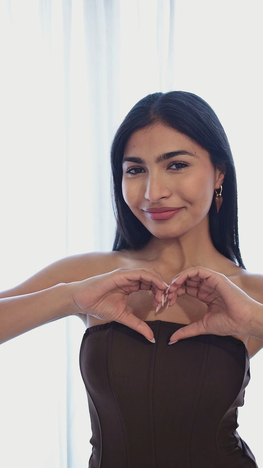 Love glaze heart earrings worn by model